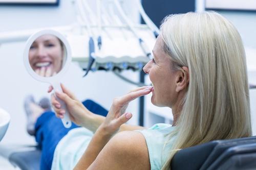 woman getting a dental implant in coburg north