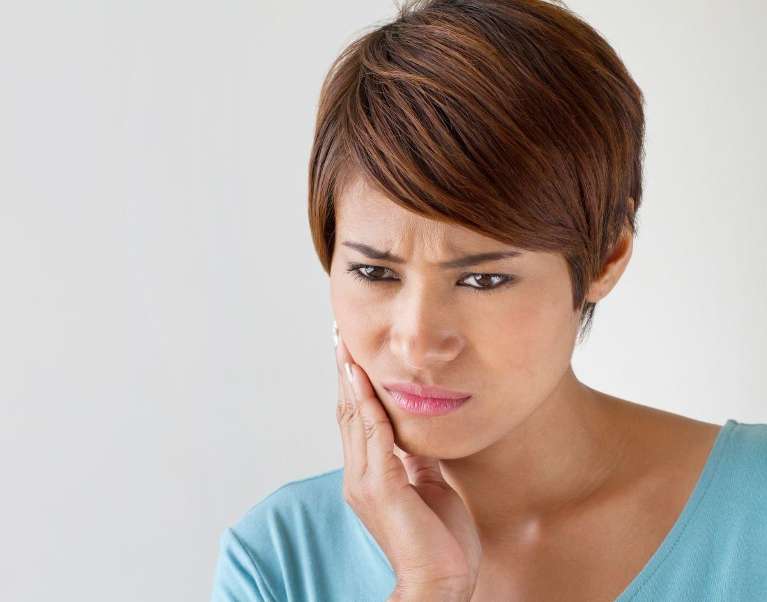 woman with a toothache in coburg north