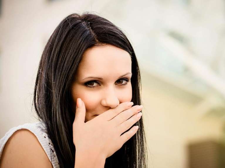 girl hiding her smile in coburg hill