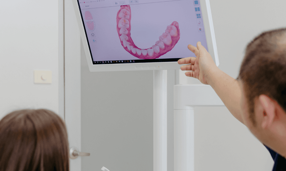 Dentist Reviewing Digital Impressions with Patient coburg hill Dentist Reviewing Digital Impressions with Patient